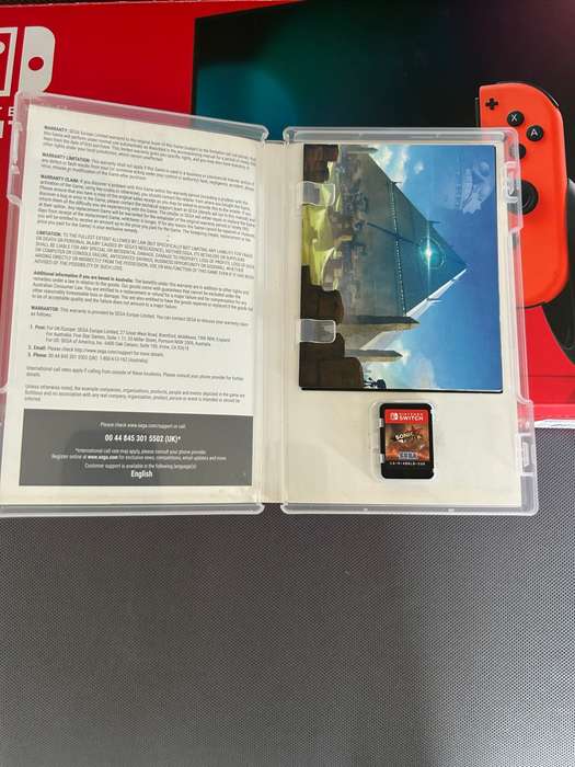 Nintendo Switch V2 Neon Red / Neon Blue + 1 Game + Case