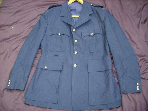 OLD SOUTH AFRICAN POLICE JACKET WITH INSIGNIA.