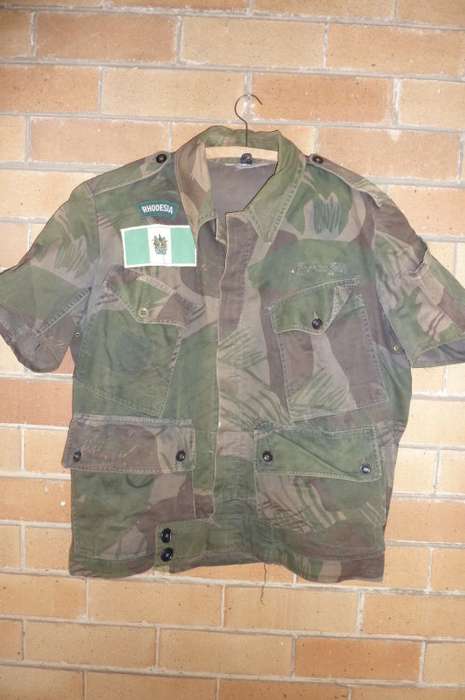 1)RHODESIAN BUSH JACKET-CUT TO PREFERENCE-SHORT SLEEVE`S and DYED DARKER-MEDIUM IN SIZE-LOW START!