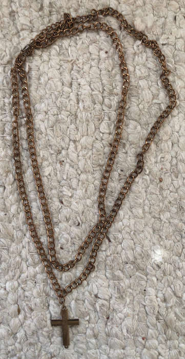 CRUCIFIX ON LONG CHAIN