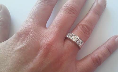 Solid sterling silver ring with three clear, faceted stones.  Size N.  4.6g