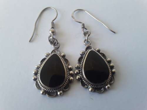 Solid sterling silver teardrop earrings with black stones. Possibly onyx