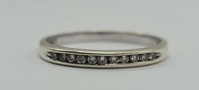 9ct WHITE GOLD INTERNITY DIAMOND RING