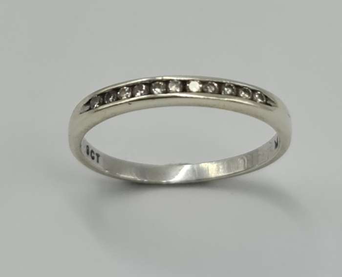 9ct WHITE GOLD INTERNITY DIAMOND RING