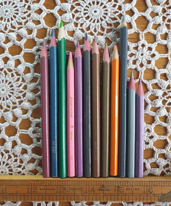 BOX  WITH PENCILS  ETC