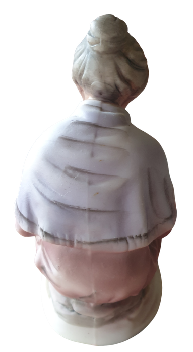 Vintage Ceramic Elderly Woman Sitting Peeling An Apple | Bisque Porcelain |