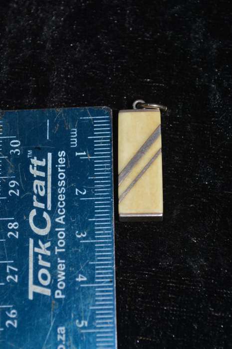 Silver stamped with bone pendant very art deco