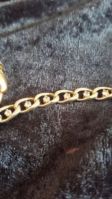 Gorgeous gold toned bracelet with shinny crystals and pearls and a large crystal ring