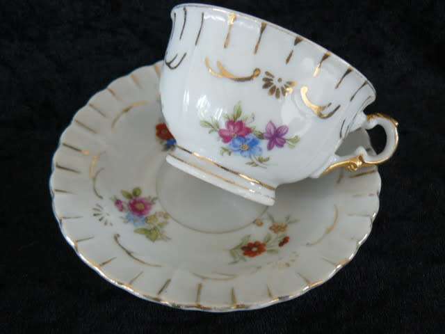 PORCELAIN CUP AND SOUCER