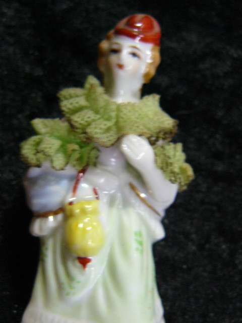 FINE PORCELAIN FIGURINES