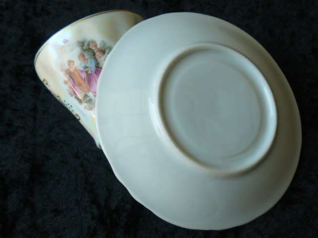 LIMOGES LIKE COFFEE CUP AND SOUCER WITH MOTHE OF PEARL EFFECT