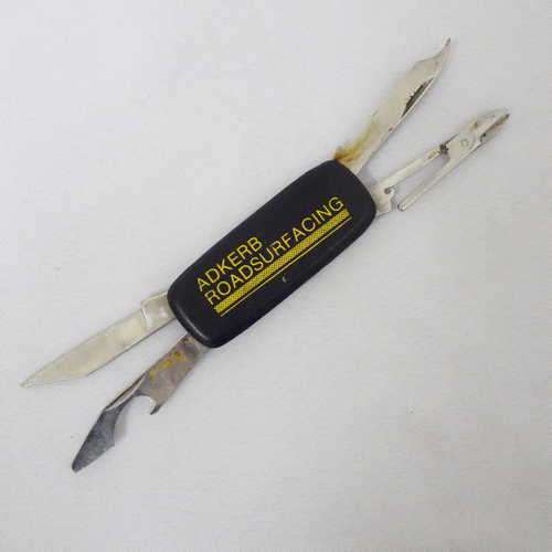 Advertising pocket knife - Adkerb Roadsurfacing - Bottle opener, scissors, knife and nail file