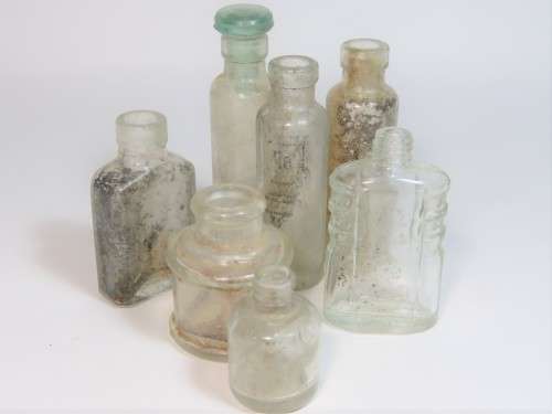 Lot of 7 vintage small glass bottles