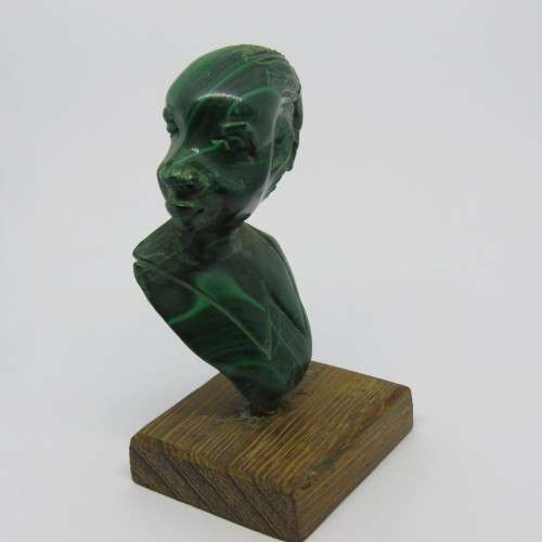 Malachite bust carving on wooden base