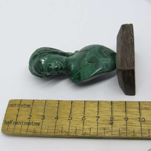 Malachite bust carving on wooden base