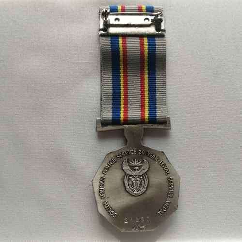 Set of 3 Police service medals issued to Warrant Officer DeVlin Williams