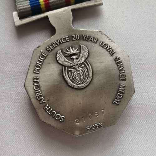 Set of 3 Police service medals issued to Warrant Officer DeVlin Williams