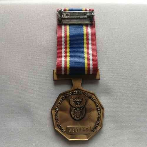 Set of 3 Police service medals issued to Warrant Officer DeVlin Williams