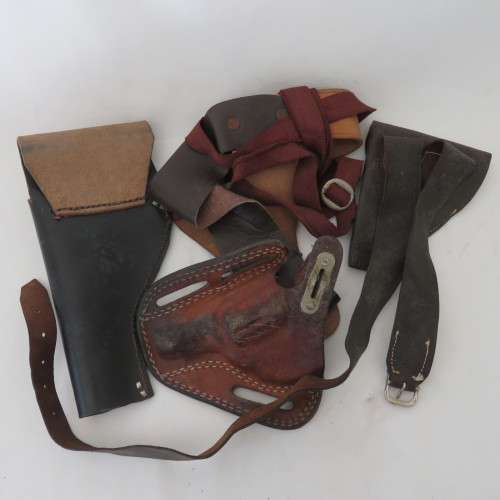 Lot of 10 leather holsters and straps for .32 and .38 revolvers