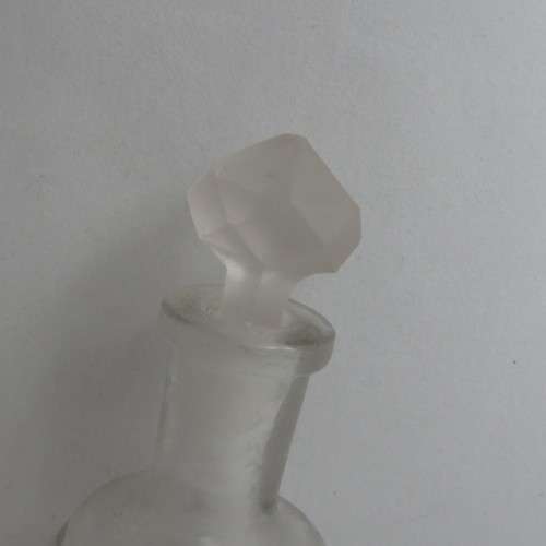 Antique perfume bottle with lid
