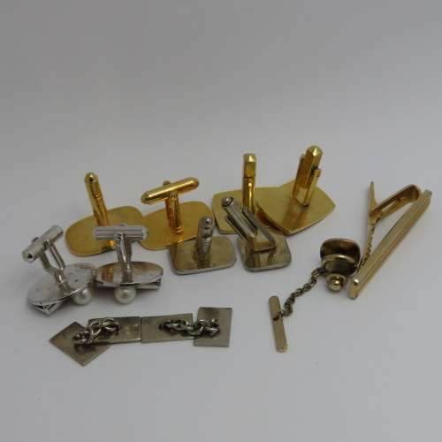 Lot of cufflinks and tie pins