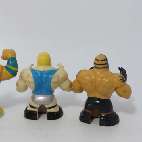 Set of 4 Wicked cool WWE wrestling Thumbpers figurines
