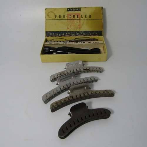 Vintage De Luxe Pro-Curler with metal hair clips