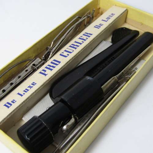Vintage De Luxe Pro-Curler with metal hair clips