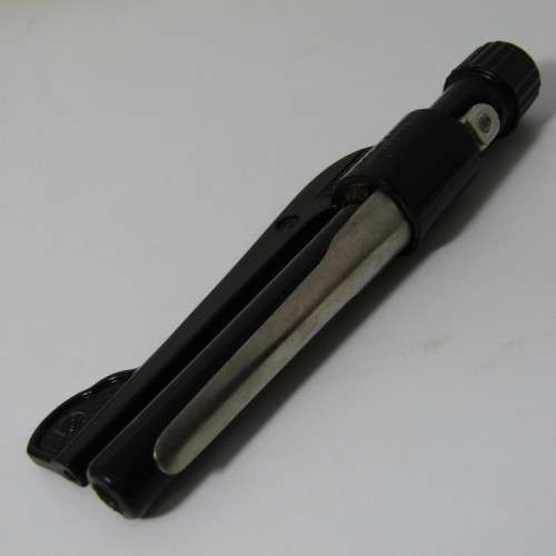 Vintage De Luxe Pro-Curler with metal hair clips