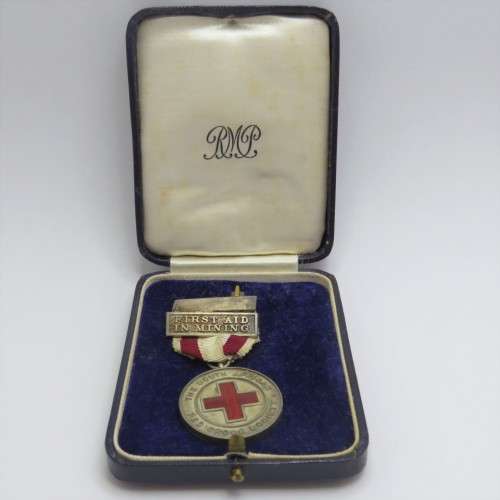 Silver First Aid in Mining Red Cross medal issued to A S Downham - With clasp