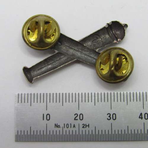 Pair of South West Africa Territorial Forces Artillery cap badges