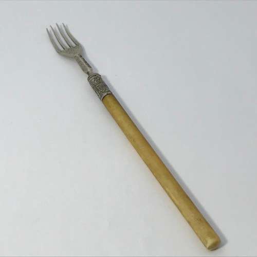 Victorian Sheffield silver pickle fork with bone handle