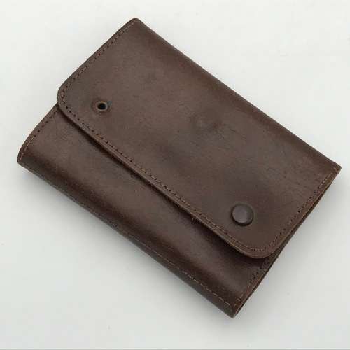 Vintage grooming kit in leather pouch - button dip missing