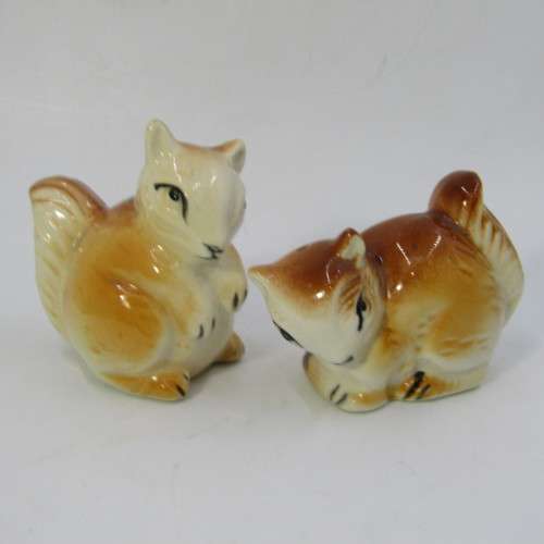 Vintage porcelain squirrels salt and pepper shaker on stand