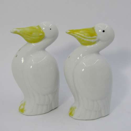 Pair of porcelain Pelican salt and pepper shakers