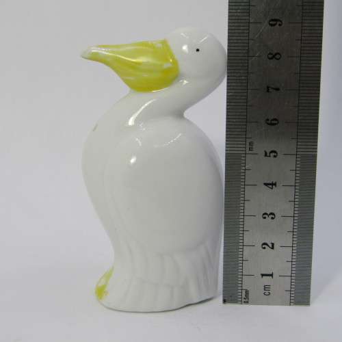 Pair of porcelain Pelican salt and pepper shakers