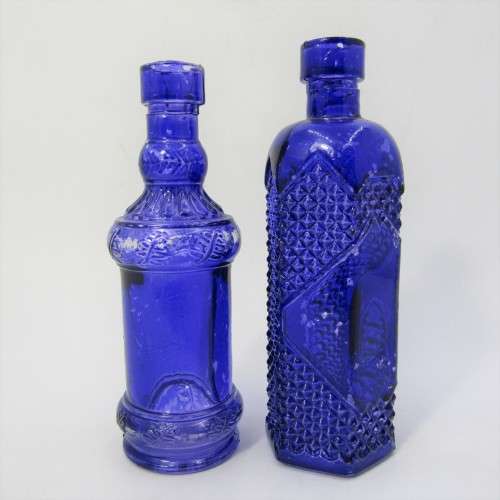 Pair of blue vintage glass bottles