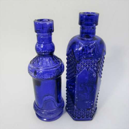 Pair of blue vintage glass bottles