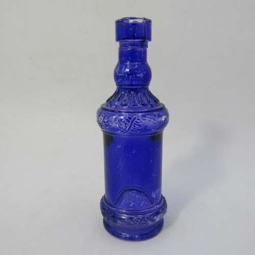 Pair of blue vintage glass bottles