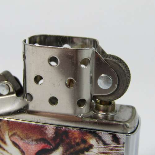Original Stainless Steel Zippo with Tiger printing - excellent condition