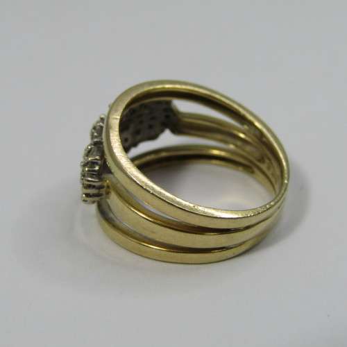 18k Gold ring with 22 baquette diamonds and 24 small round diamonds - weighs 6,1g - size M