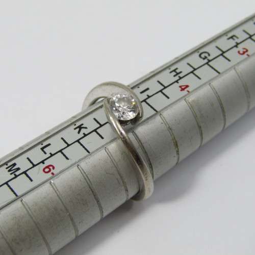 18kt White Gold ring with round brilliant diamond of 0.36 carat color I/J - size J