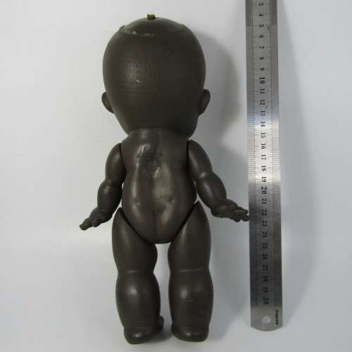 Pair of vintage African rubber dolls