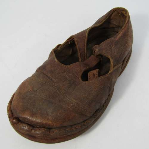 Pair of antique leather girl shoes