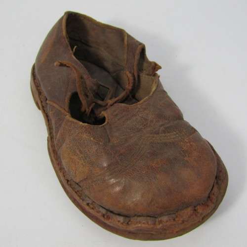 Pair of antique leather girl shoes