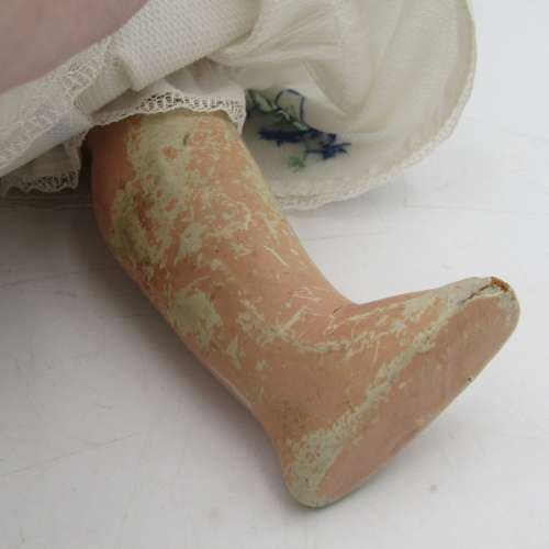 Antique Composition doll with clothing