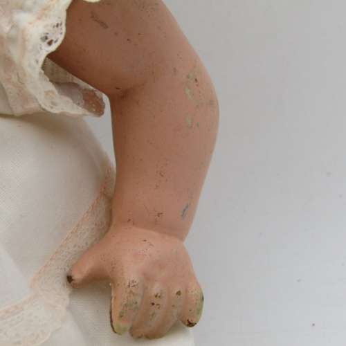 Antique Composition doll with clothing