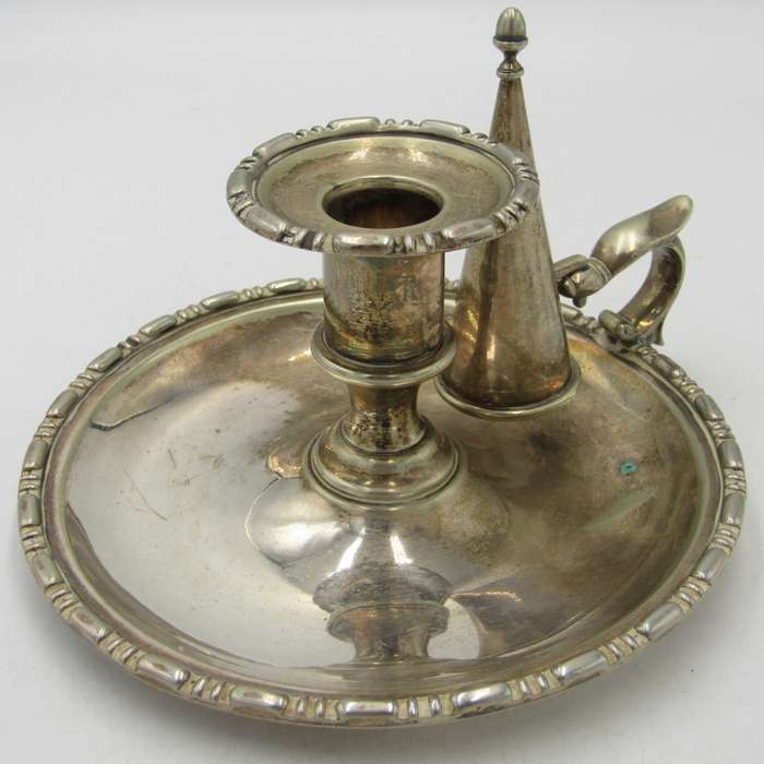 Beautiful vintage silverplated candle holder with snuffer