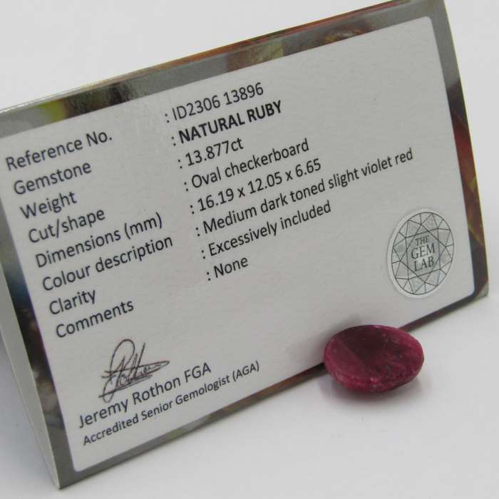 Natural Ruby of 13,8 carat oval checkerboard dark toned slight violet red with Gemlab certificate