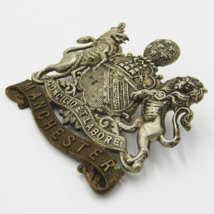 Royal Army Manchester regiment cap badge
